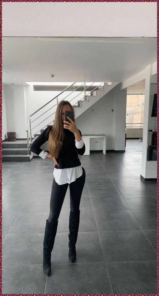 knee-high boots with skinny jeans and an oversized sweater
