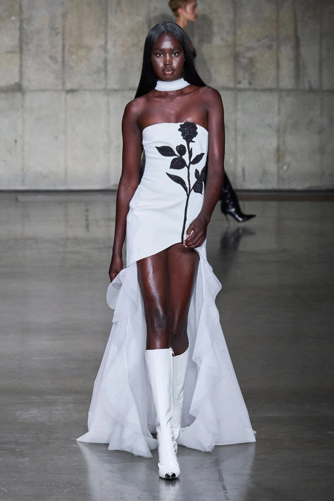 David Koma Spring 2024 Ready To Wear - outfit with knee-high boots